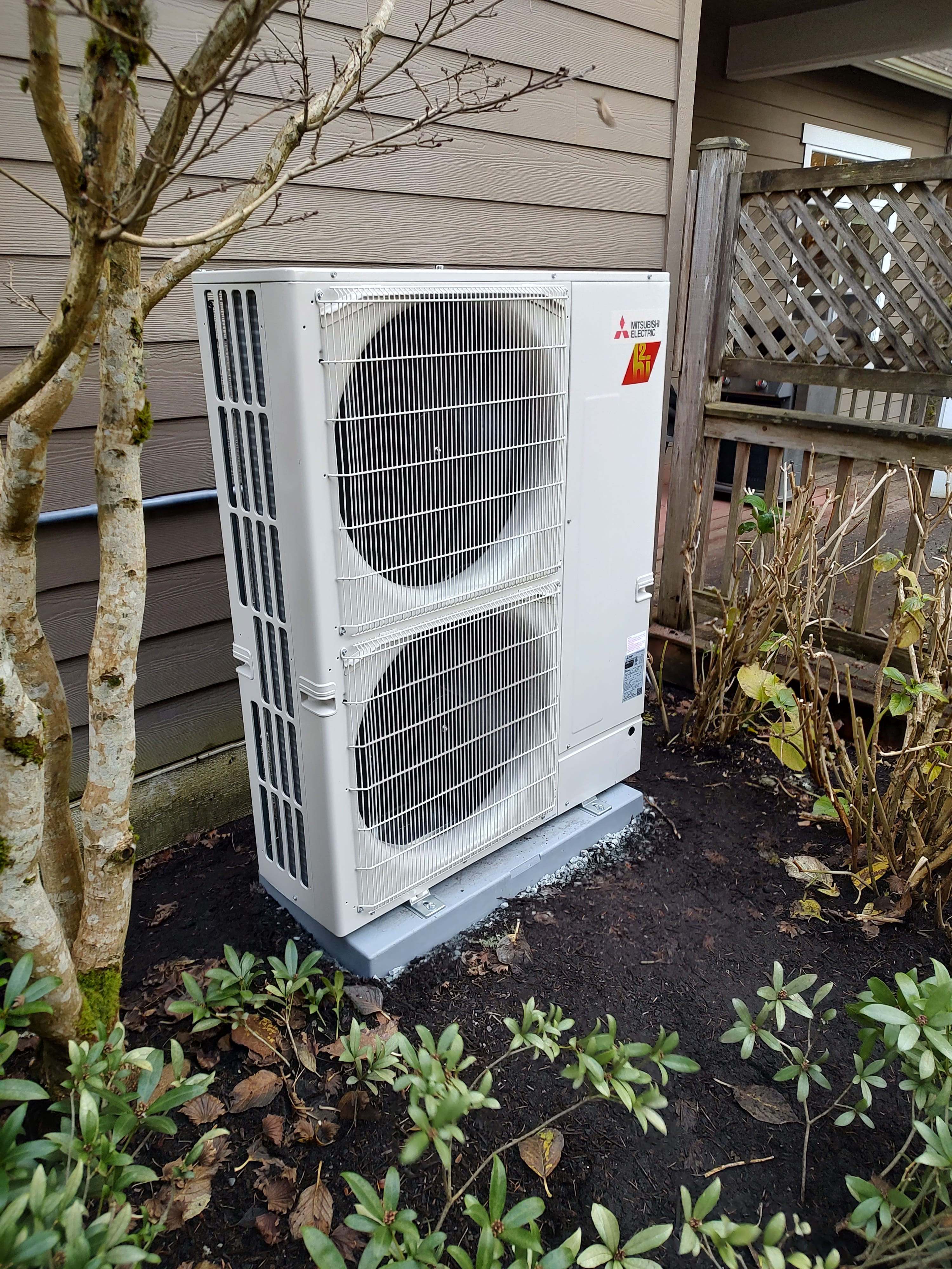 New residential air conditioning system installed outdoors
